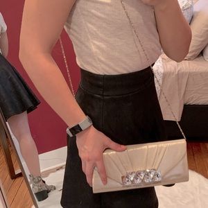 Call it Spring gold crossbody/clutch